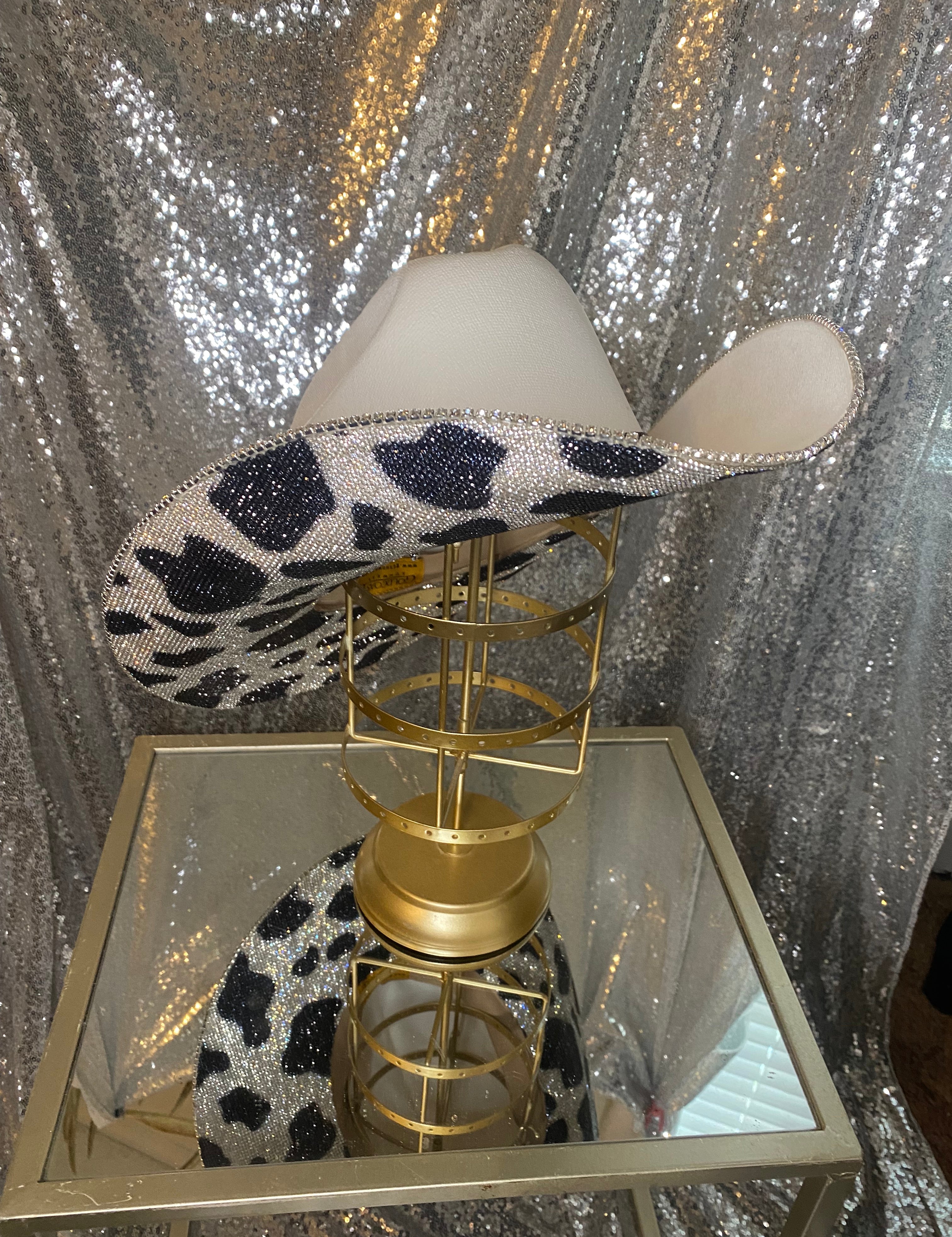 Underneath brim only rhinestoned with matching hat band