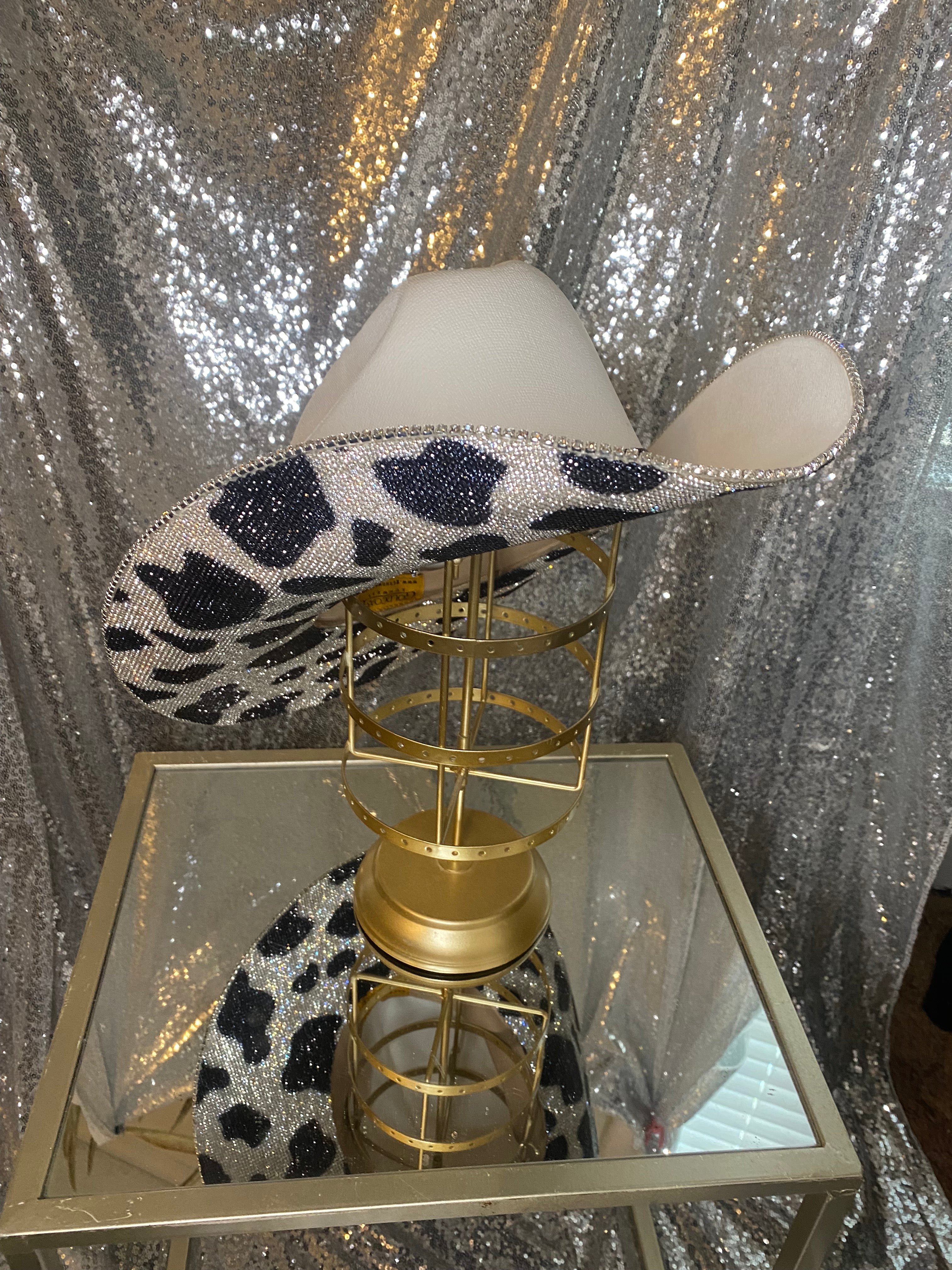 Underneath brim only rhinestoned with matching hat band
